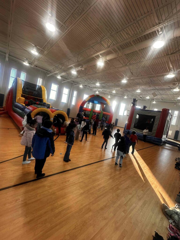 Kids playing indoors at a community event in Atlanta, GA